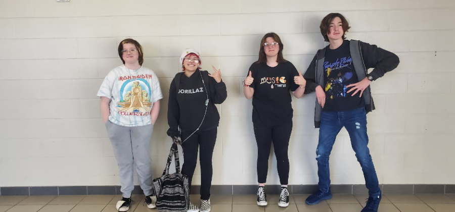 Science Hill students pose in band-themed T-shirts