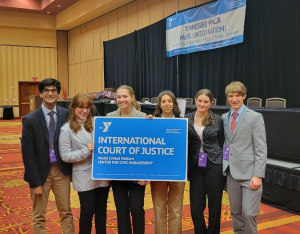 The Model U.N. team poses at a November conference
