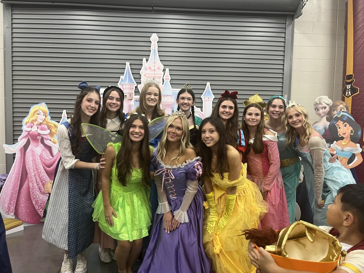 SHHS Dance team upholding their tradition of dressing as Disney Princesses for the annual Trunk or Treat